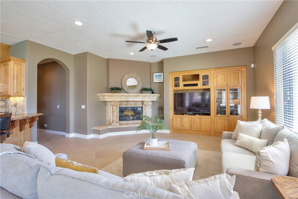 41380 La Sierra Road Temecula, CA 92591 - Photo 13 of 72 a living room with furniture and a fireplace