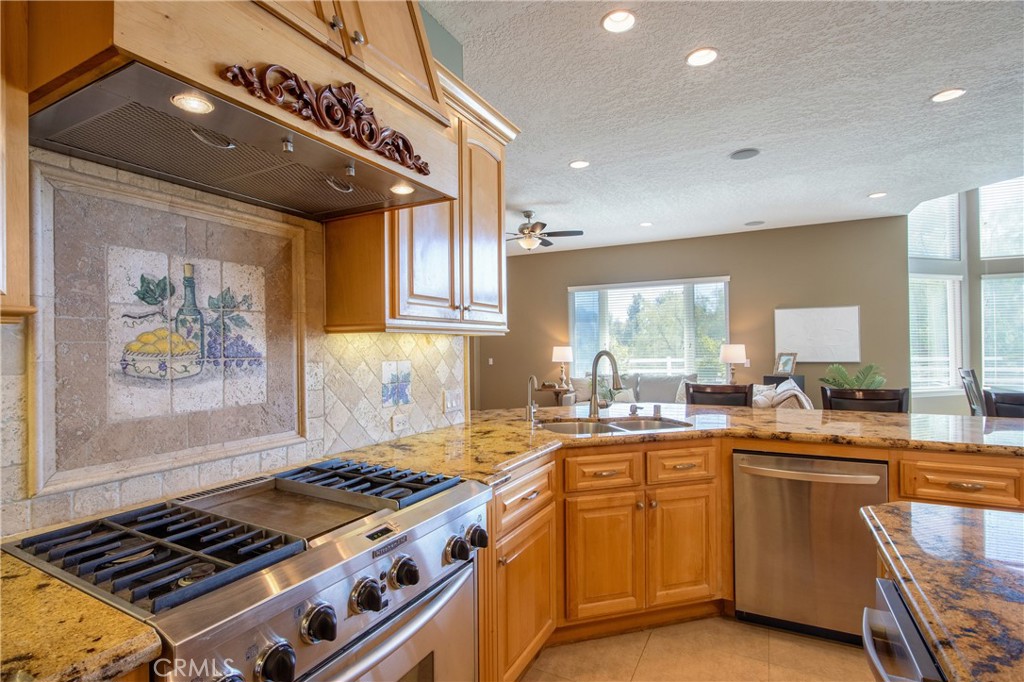 41380 La Sierra Road Temecula, CA 92591 - Photo 18 of 72 a kitchen with a stove and a sink