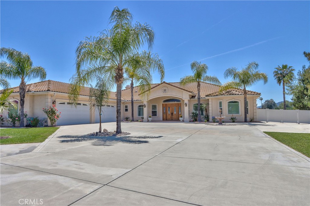 41380 La Sierra Road Temecula, CA 92591 - Photo 2 of 72 a house with palm tree in front of it