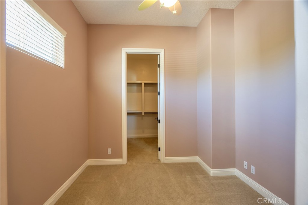 41380 La Sierra Road Temecula, CA 92591 - Photo 37 of 72 a view of an empty room with closet and a window