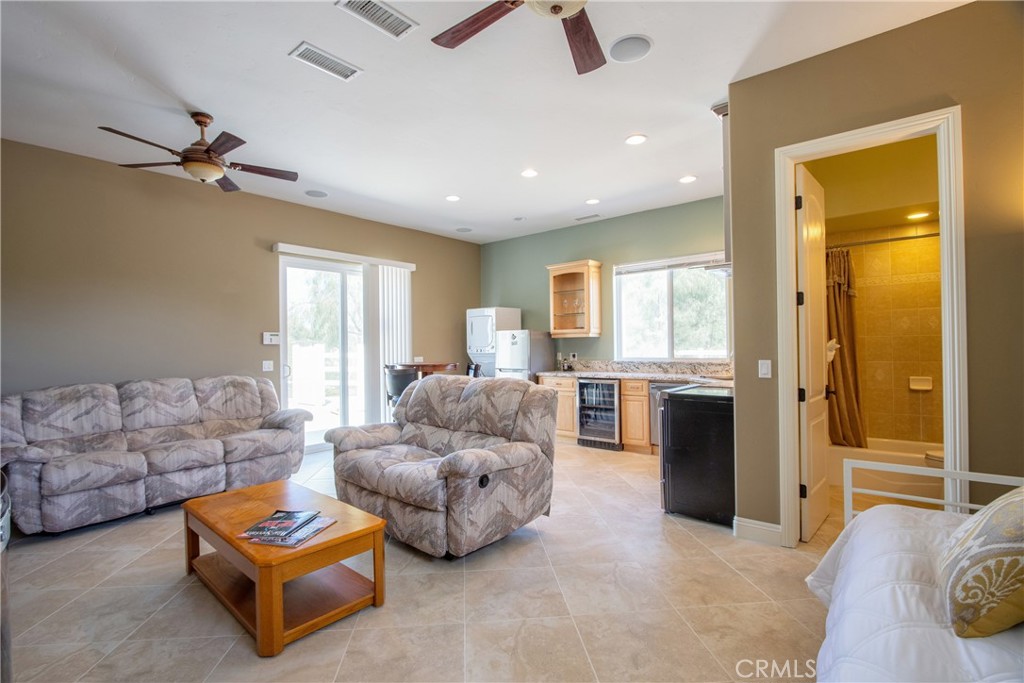 41380 La Sierra Road Temecula, CA 92591 - Photo 39 of 72 a bedroom with furniture and a couch