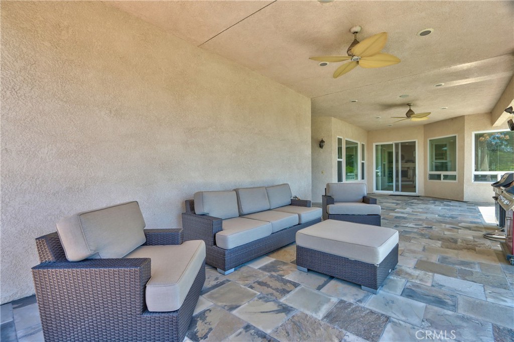 41380 La Sierra Road Temecula, CA 92591 - Photo 46 of 72 a living room with furniture and a large window