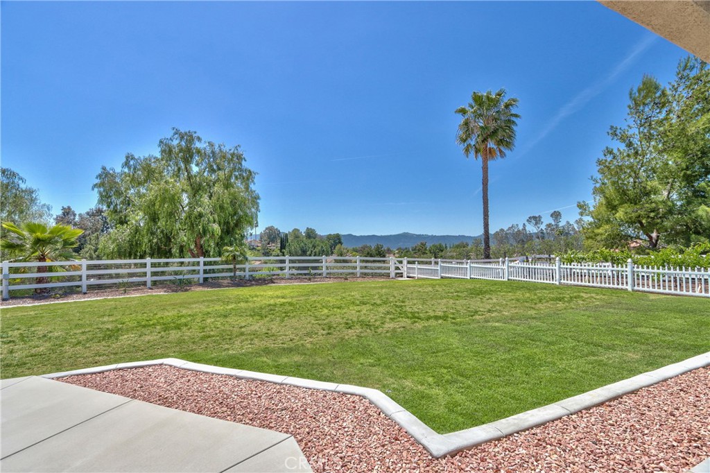 41380 La Sierra Road Temecula, CA 92591 - Photo 47 of 72 a view of a garden with a lake