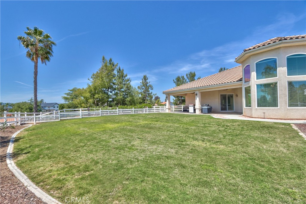 41380 La Sierra Road Temecula, CA 92591 - Photo 49 of 72 a front view of a house with garden
