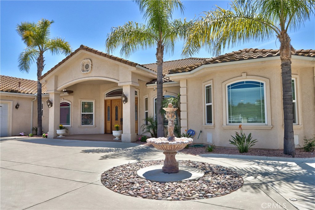 41380 La Sierra Road Temecula, CA 92591 - Photo 5 of 72 a front view of a house with a yard