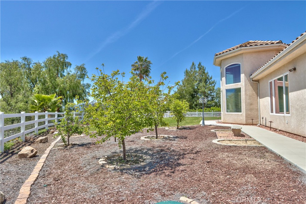 41380 La Sierra Road Temecula, CA 92591 - Photo 51 of 72 a backyard of a house with lots of green space