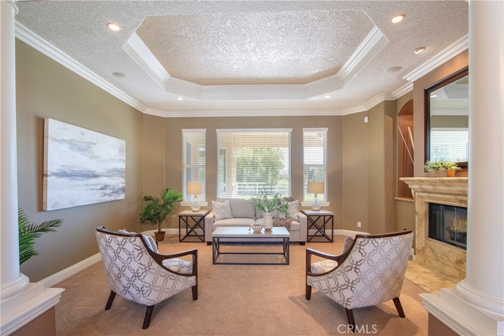 41380 La Sierra Road Temecula, CA 92591 - Photo 6 of 72 a living room with furniture and a fireplace