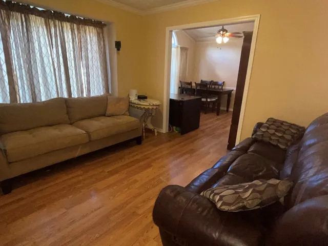 a living room with furniture and a couch