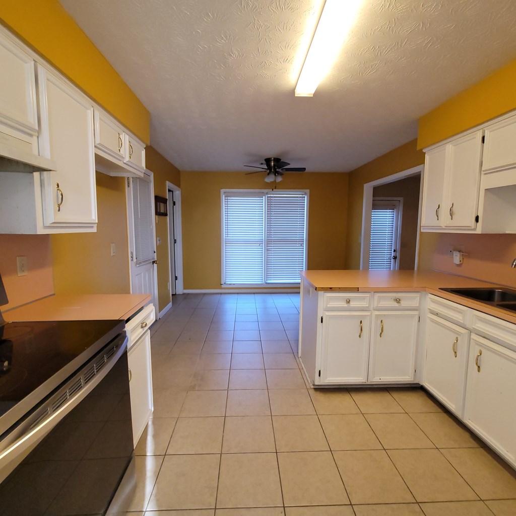 532 Paula Court Columbus, GA 31907 - Photo 18 of 54 a kitchen with a sink and cabinets