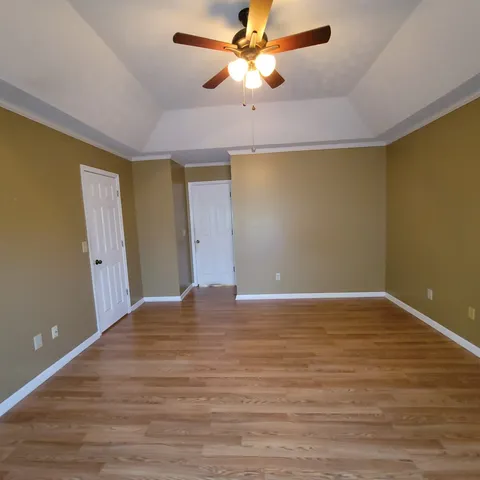 a bathroom with a sink a large mirror and a bathtub
