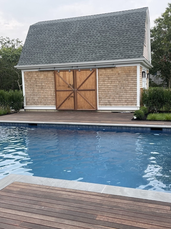 27 Bold Meadow Road Edgartown, MA 02539 - Photo 17 of 40 a view of a lake from a balcony