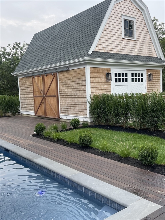 27 Bold Meadow Road Edgartown, MA 02539 - Photo 19 of 40 a house with a street