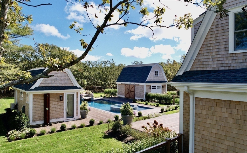 27 Bold Meadow Road Edgartown, MA 02539 - Photo 22 of 40 a front view of house with yard and green space