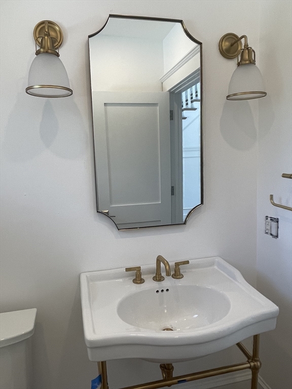 27 Bold Meadow Road Edgartown, MA 02539 - Photo 27 of 40 a bathroom with a sink and a mirror
