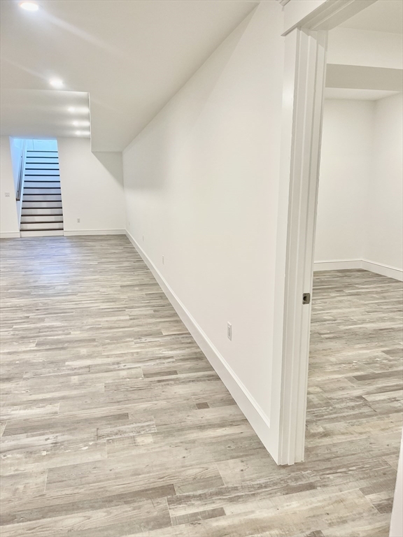 27 Bold Meadow Road Edgartown, MA 02539 - Photo 35 of 40 a view of a hallway with wooden floor
