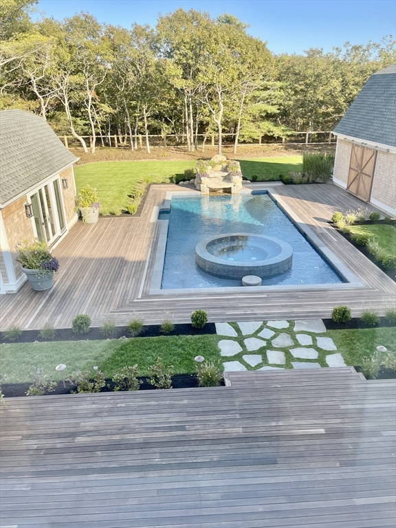 27 Bold Meadow Road Edgartown, MA 02539 - Photo 39 of 40 a view of a swimming pool with a yard and mountain view