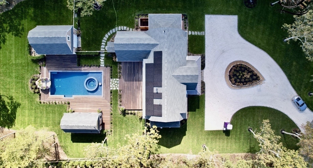 27 Bold Meadow Road Edgartown, MA 02539 - Photo 40 of 40 a aerial view of a house with swimming pool and porch
