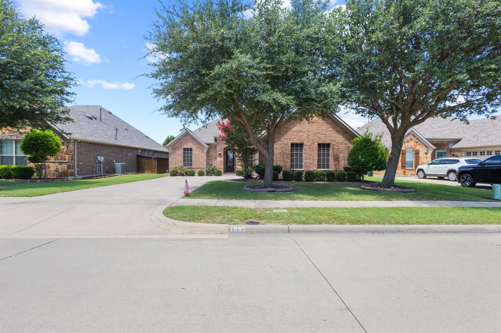 1995 Verde Court Allen, TX 75013 - Photo 29 of 30 Single-story brick residence with an attached two-car garage