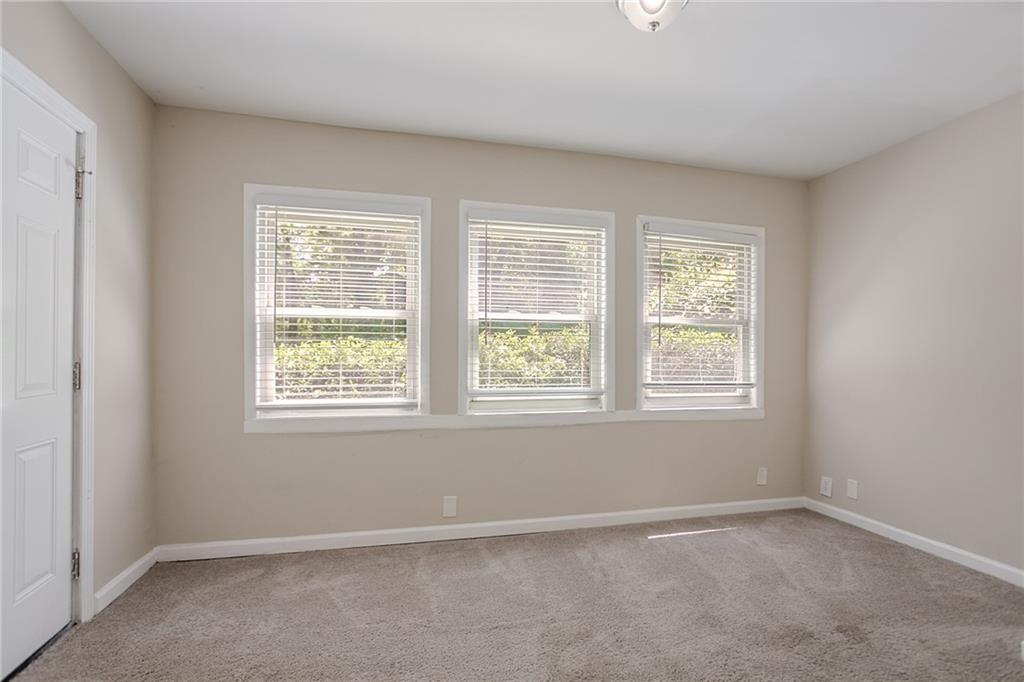 2755 Rockcliff Road Southeast Atlanta, GA 30316 - Photo 17 of 37 an empty room with a window
