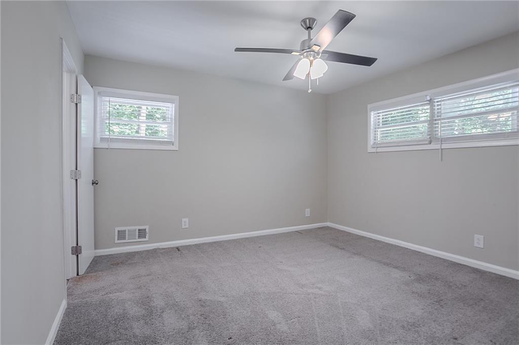 2755 Rockcliff Road Southeast Atlanta, GA 30316 - Photo 22 of 37 a view of an empty room with a window