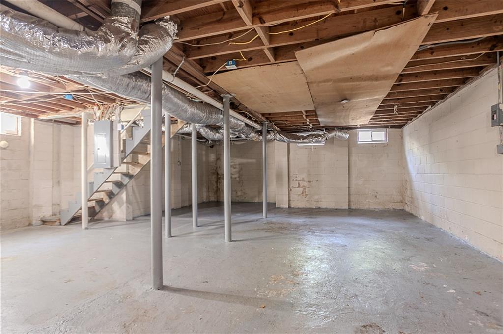 2755 Rockcliff Road Southeast Atlanta, GA 30316 - Photo 28 of 37 a view of an empty room with stairs