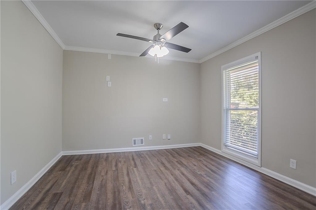 2755 Rockcliff Road Southeast Atlanta, GA 30316 - Photo 10 of 37 wooden floor in an empty room with a window