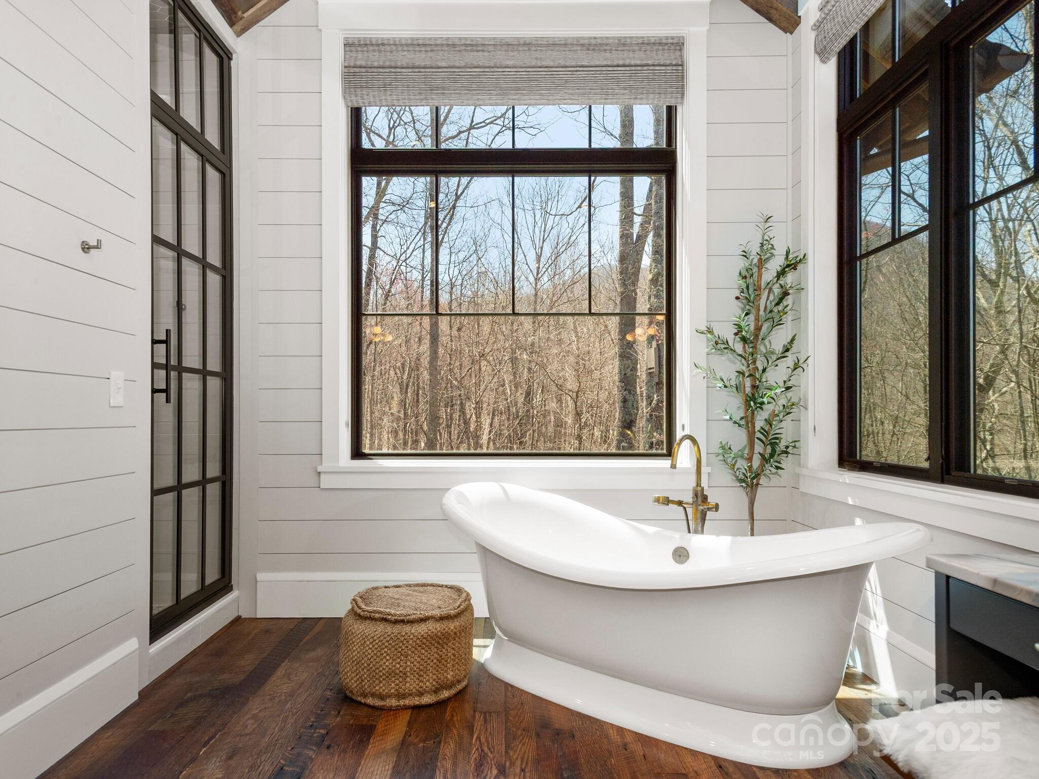 61 Back Bone Way, Unit 203 Sylva, NC 28779 - Photo 24 of 48 a bathroom with a sink and a large window