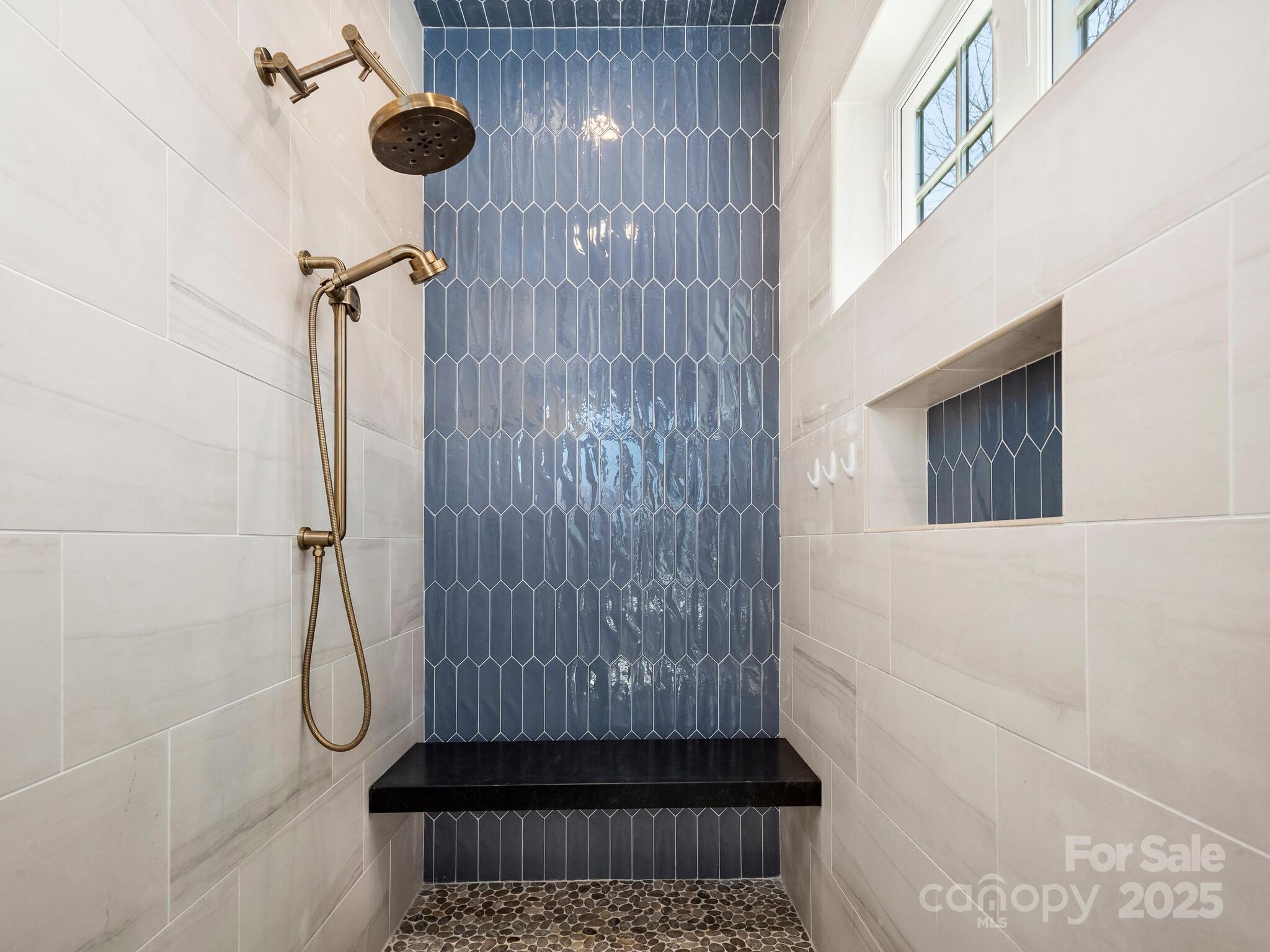 61 Back Bone Way, Unit 203 Sylva, NC 28779 - Photo 25 of 48 a bathroom with a shower