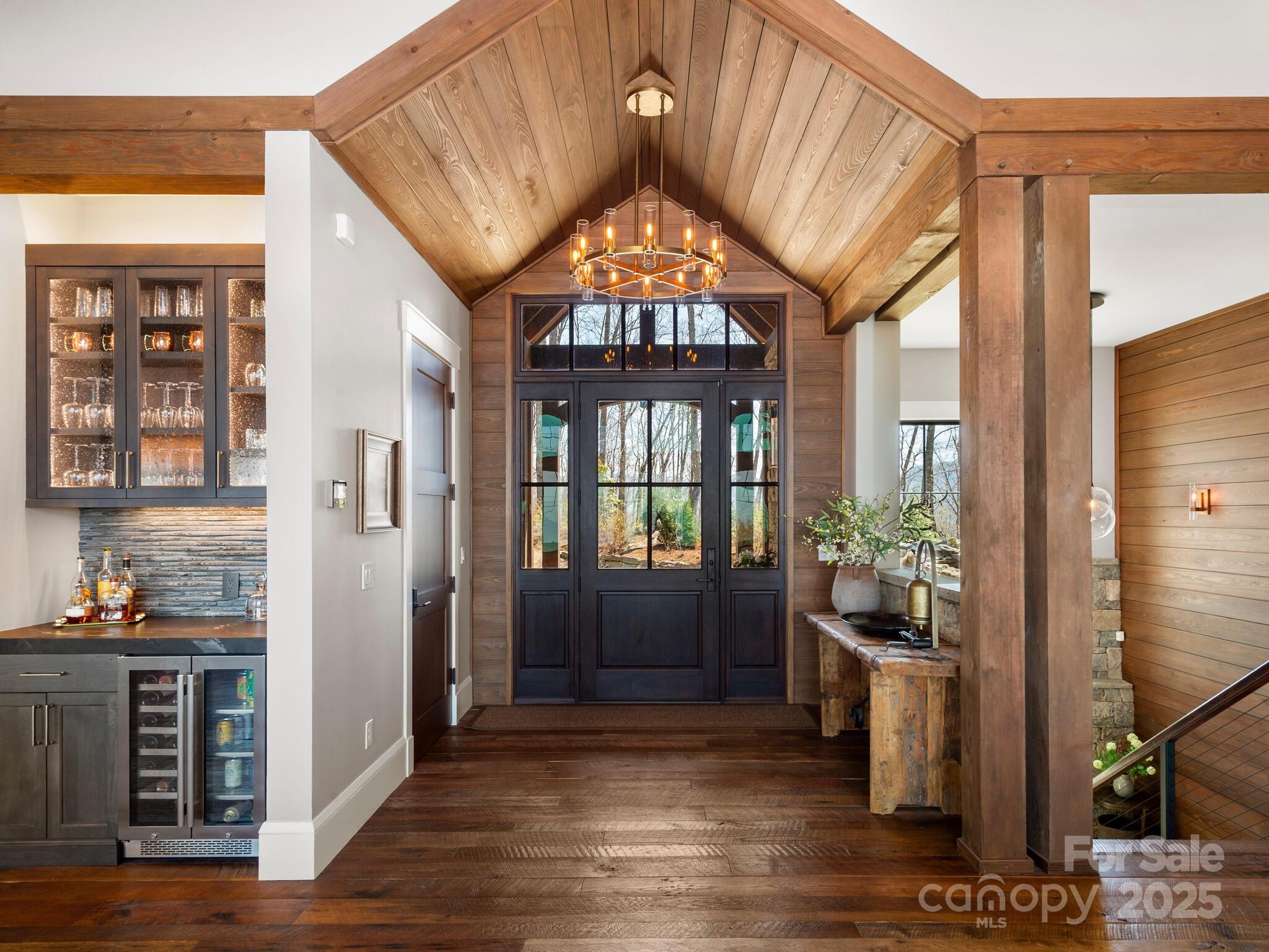 61 Back Bone Way, Unit 203 Sylva, NC 28779 - Photo 3 of 48 a view of an entryway with wooden floor and a rug