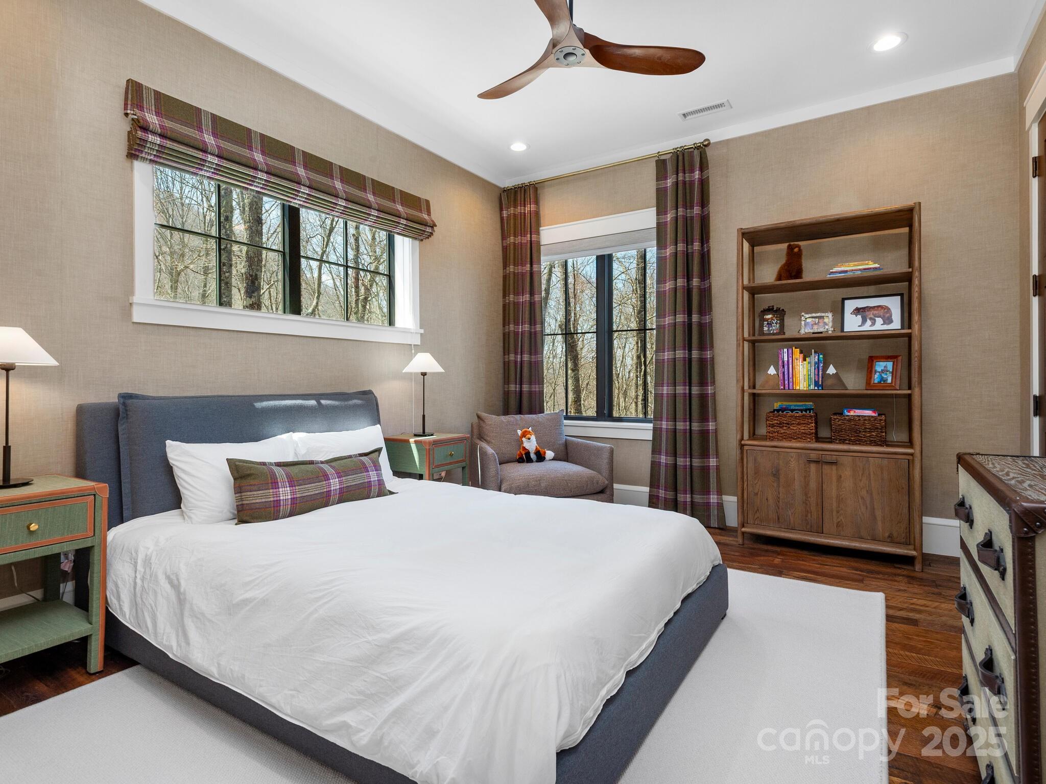 61 Back Bone Way, Unit 203 Sylva, NC 28779 - Photo 40 of 48 a bedroom with a large bed and a window