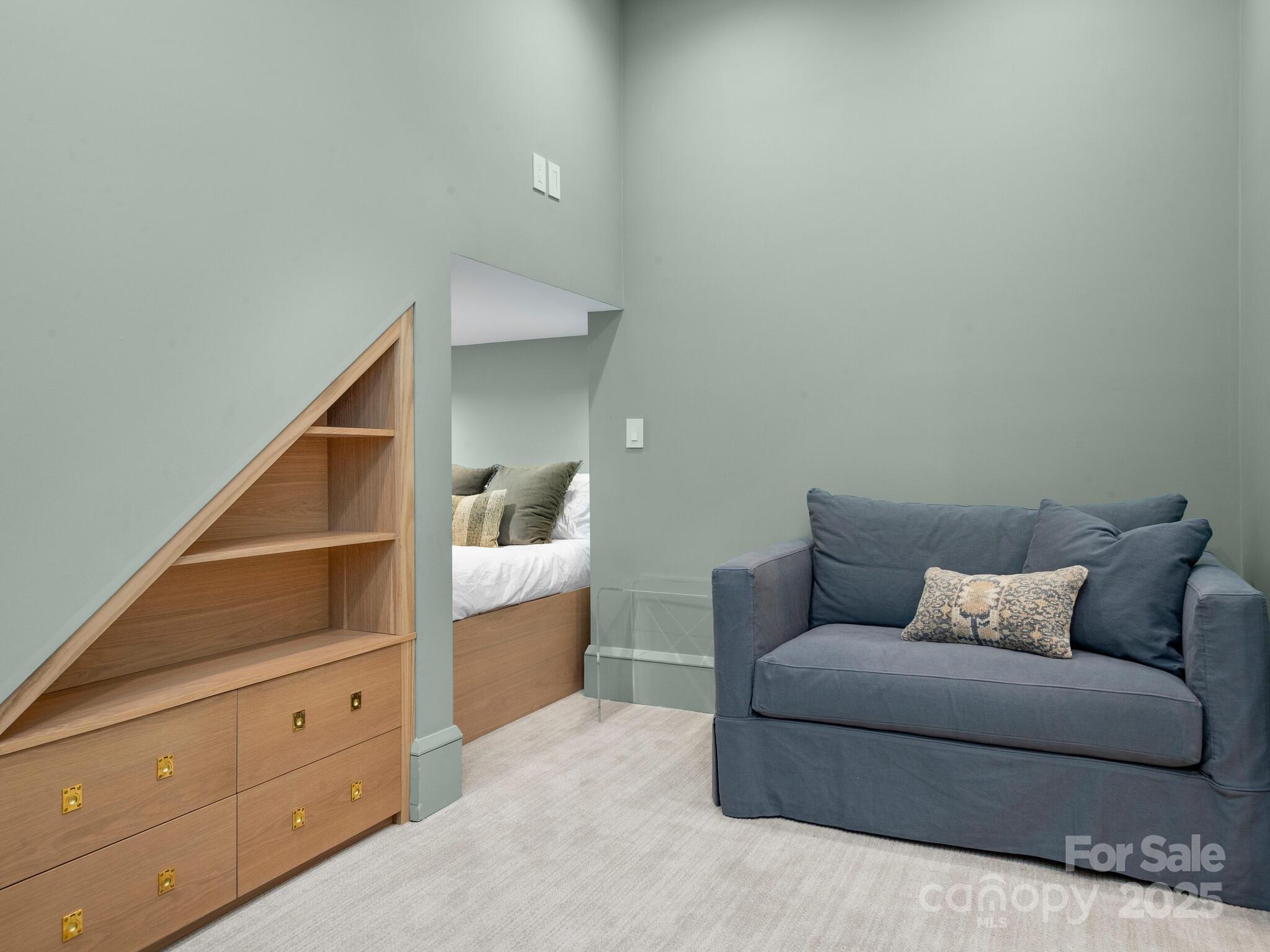61 Back Bone Way, Unit 203 Sylva, NC 28779 - Photo 43 of 48 a living room with furniture and the ceiling fan