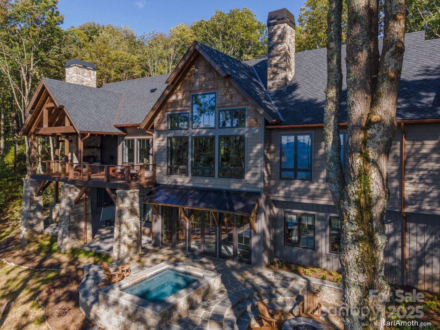 61 Back Bone Way, Unit 203 Sylva, NC 28779 - Photo 48 of 48 a front view of a house with a yard balcony