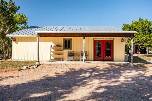 a kitchen with a stove and cabinets