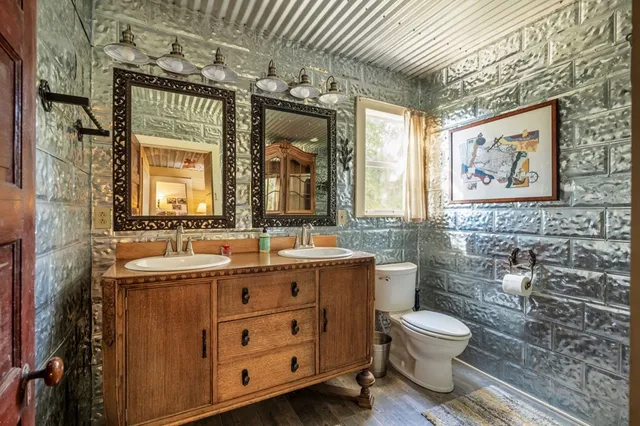 a view of living room with furniture and a window