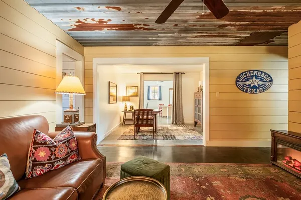 a bathroom with a toilet sink and shower