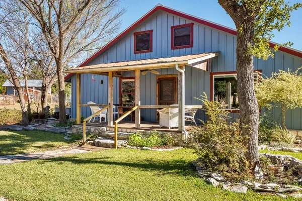 a spacious bathroom with a granite countertop sink toilet and shower