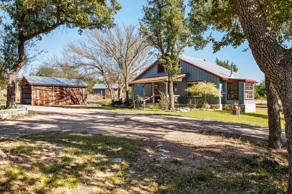 a view of a swimming pool with an outdoor space and seating area