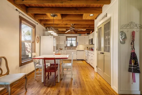 a room with furniture and flat screen tv