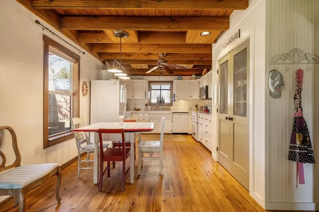 a room with furniture and flat screen tv