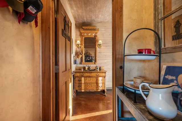 an aerial view of residential house with outdoor space and river view