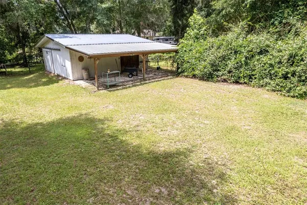 a view of outdoor space and yard