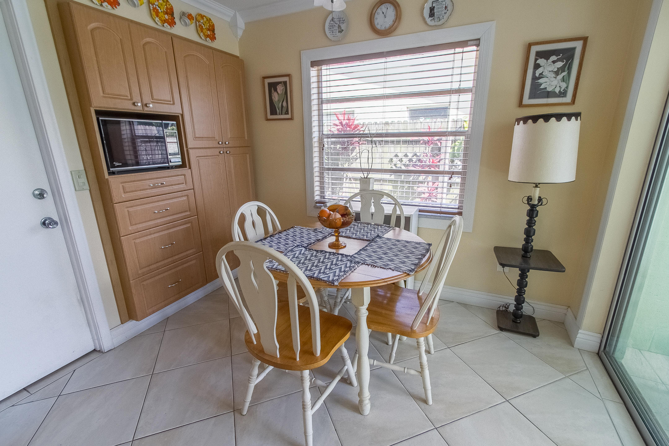 22366 Southwest 65th Avenue Boca Raton, FL 33428 - Photo 13 of 22 a dining room with furniture and window