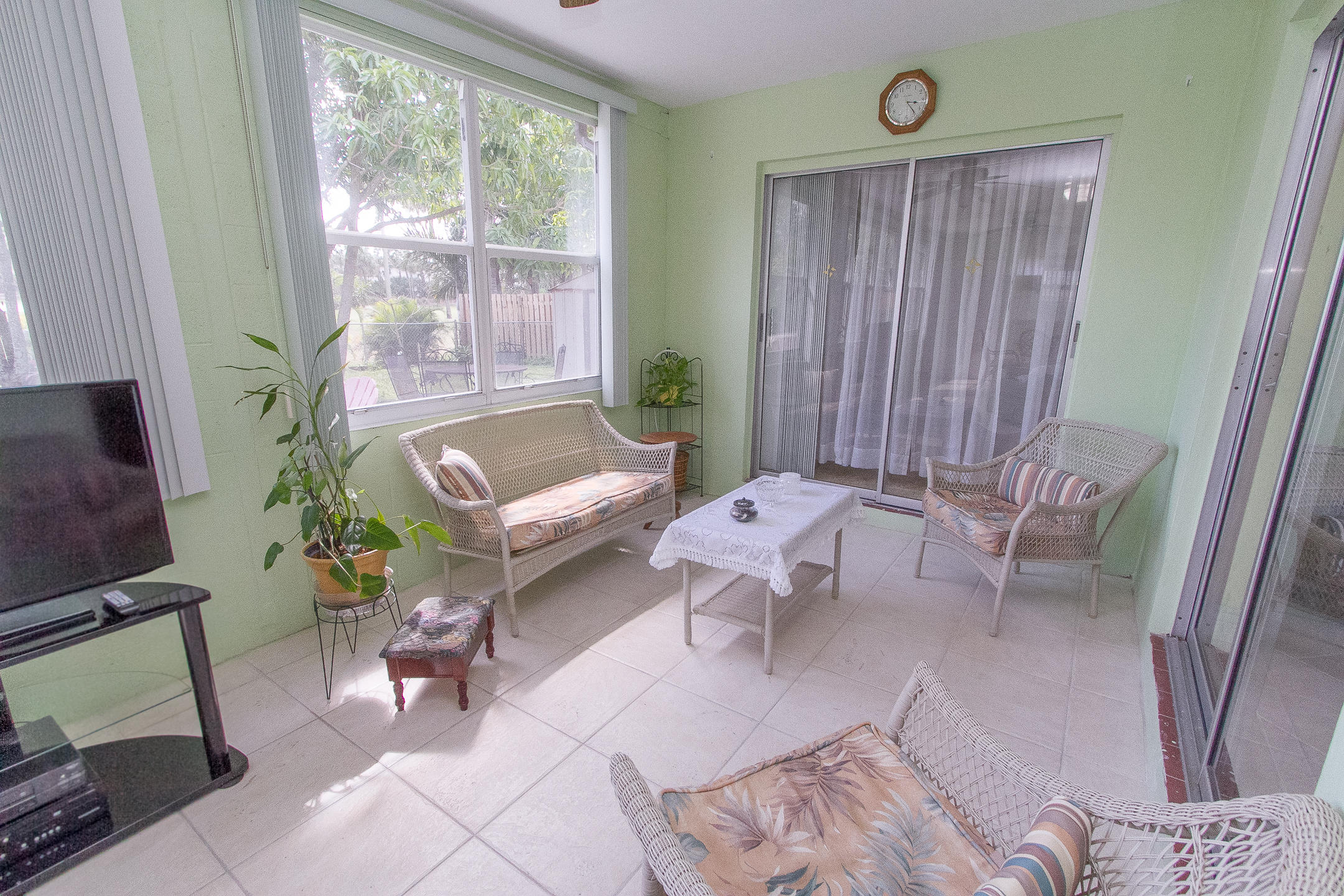 22366 Southwest 65th Avenue Boca Raton, FL 33428 - Photo 14 of 22 a living room with furniture and a window