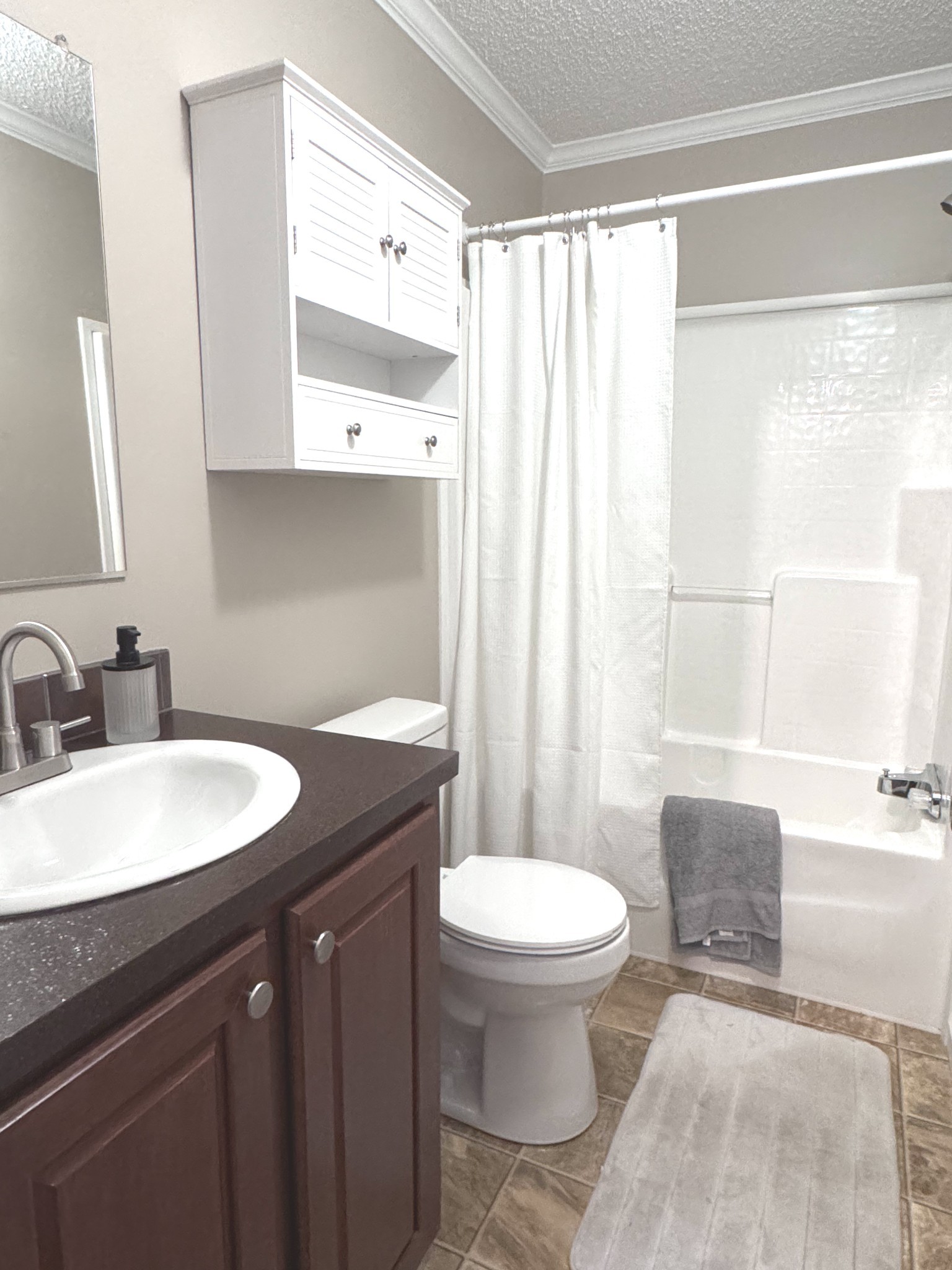 181 Duke Road Dickson, TN 37055 - Photo 13 of 22 a bathroom with a sink a toilet and a bathtub