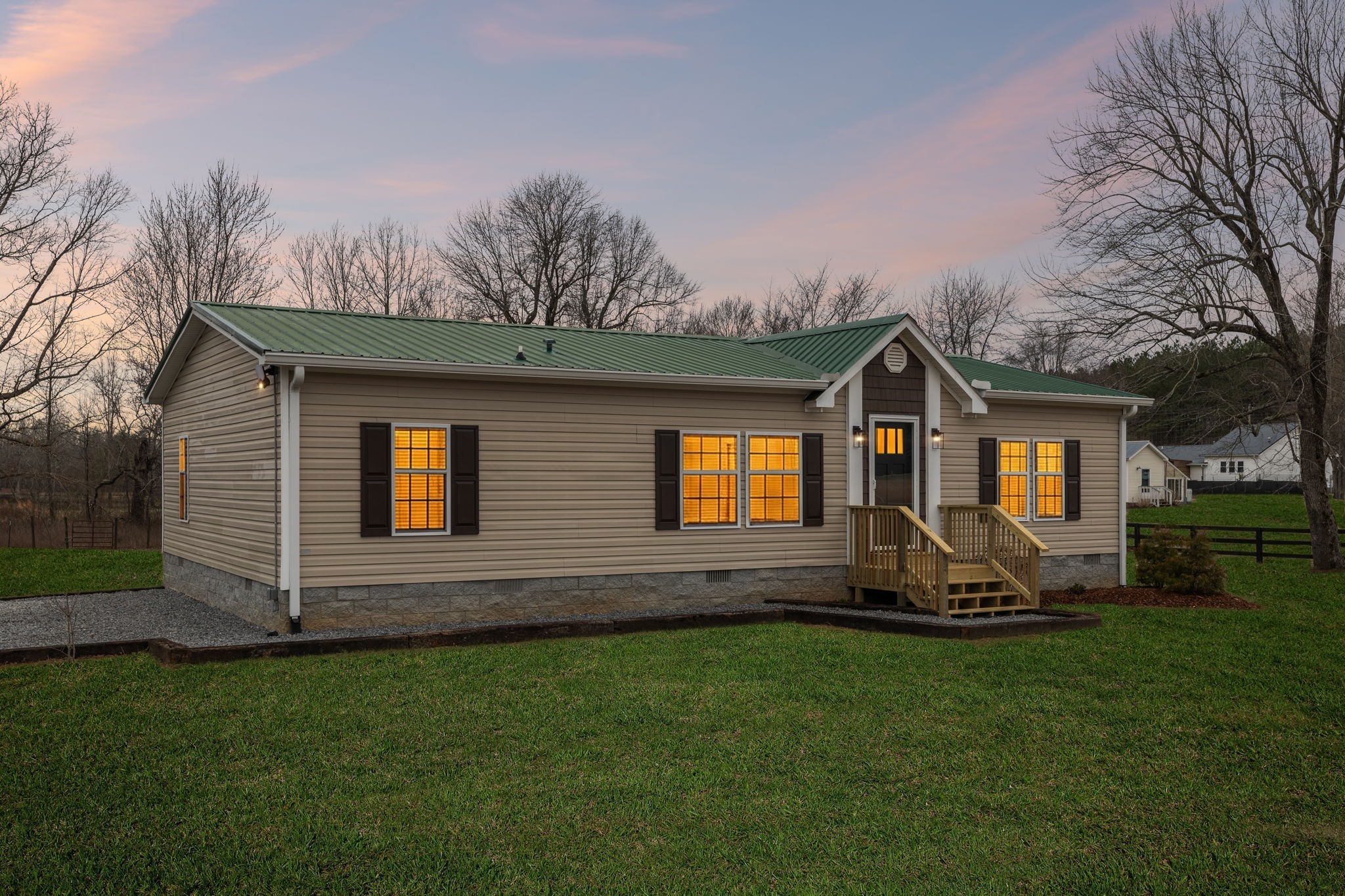 181 Duke Road Dickson, TN 37055 - Photo 16 of 22 a front view of a house with a garden
