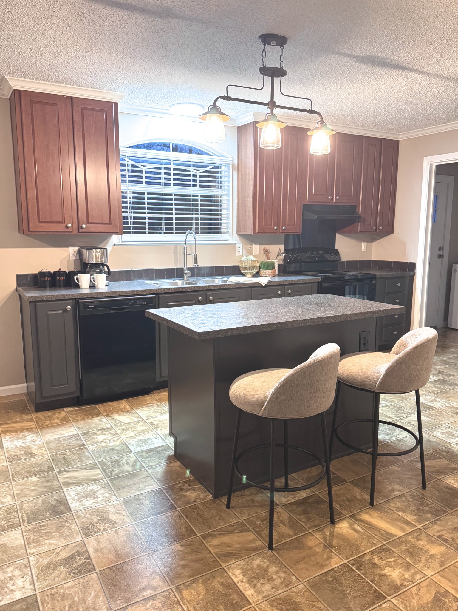 181 Duke Road Dickson, TN 37055 - Photo 5 of 22 a kitchen with stainless steel appliances granite countertop a sink and a refrigerator
