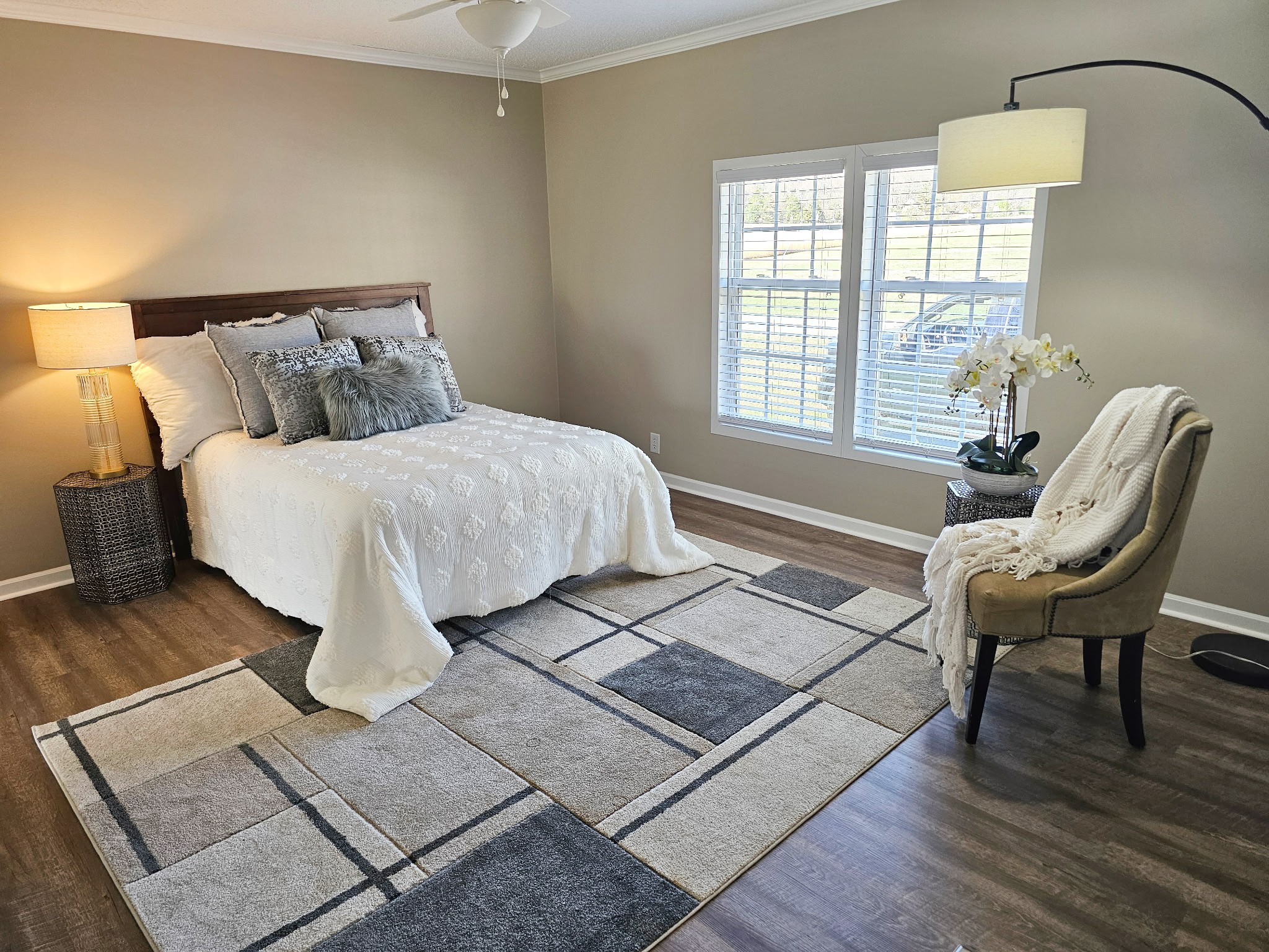 181 Duke Road Dickson, TN 37055 - Photo 6 of 22 a spacious bedroom with a bed and wooden floor