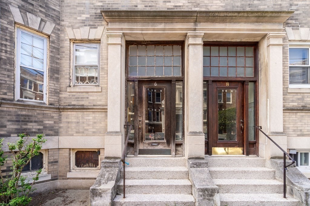 6 Colborne Road, Unit 1 Boston, MA 02135 - Photo 11 of 11 a front view of a building with a porch