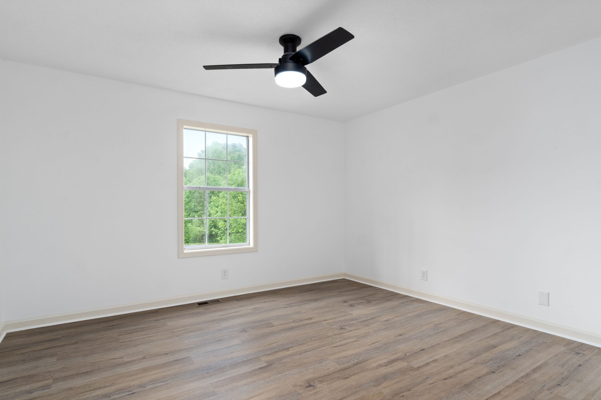 198 Cummings Creek Road Clarksville, TN 37042 - Photo 20 of 43 wooden floor in an empty room with a window