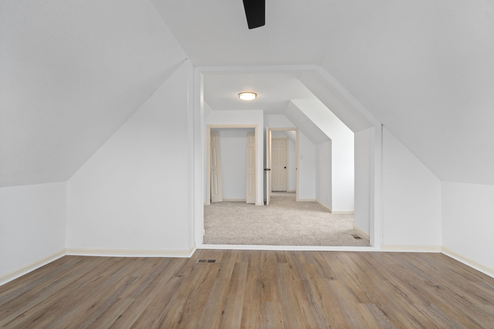 198 Cummings Creek Road Clarksville, TN 37042 - Photo 32 of 43 a view of an empty room with wooden floor